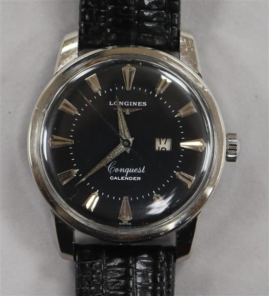 A gentlemans stainless steel Longines Conquest Calendar wrist watch